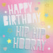 Colorful gradient napkin package featuring "Happy Birthday" and "Hip Hip Hooray" text in white striped lettering, decorated with gold hearts, stars, and pastel confetti designs on a pink, blue, and yellow ombre background.