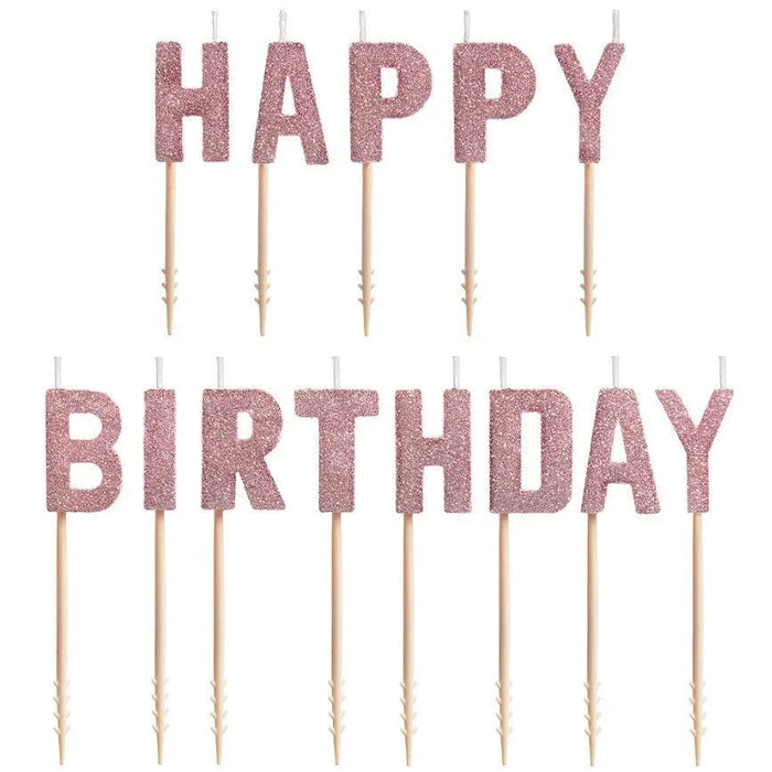 Rose gold glitter letter candles spelling "Happy Birthday" on wooden picks, 13 pieces total.
