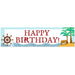 Horizontal birthday banner with light blue border featuring "HAPPY BIRTHDAY!" in large red text, decorated with a ship's wheel on the left, palm tree and treasure chest on the right, and ocean waves in the background.