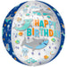 Spherical clear balloon with "HAPPY BIRTHDAY" text in turquoise and orange letters, decorated with smiling sharks, tropical fish, jellyfish, and purple bubbles on white and dark blue background.