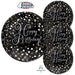Four-sided black foil balloons with white and gold confetti designs and "Happy Birthday" script text in silver lettering.