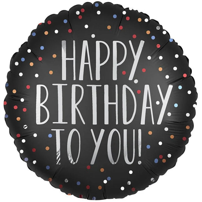 Black round mylar balloon with white "Happy Birthday To You" text surrounded by colorful confetti dots in red, blue, orange, and white.