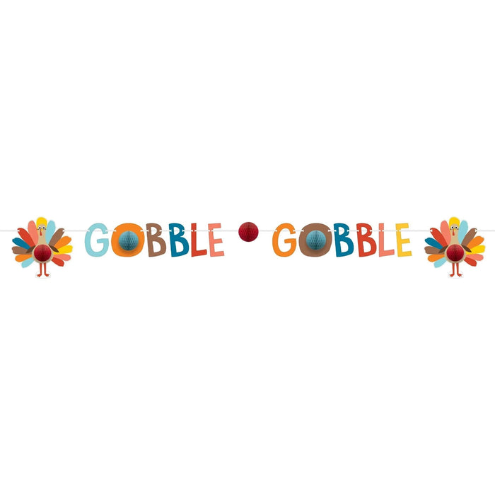 Colorful banner string featuring two turkey illustrations with fanned tail feathers on each end and "GOBBLE GOBBLE" text in multicolored letters with honeycomb decorative elements between them.