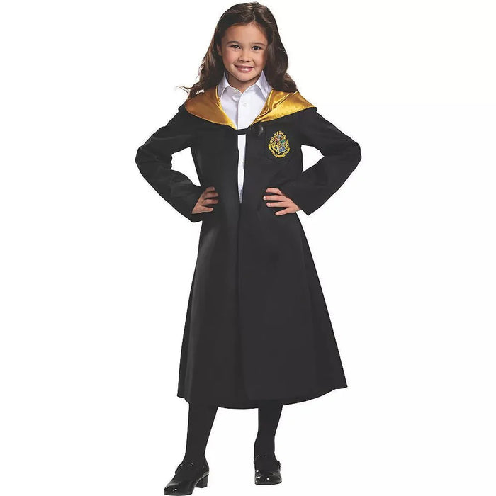 Child wearing a black wizard robe with gold-lined collar and a crest emblem, paired with a white shirt and black shoes.