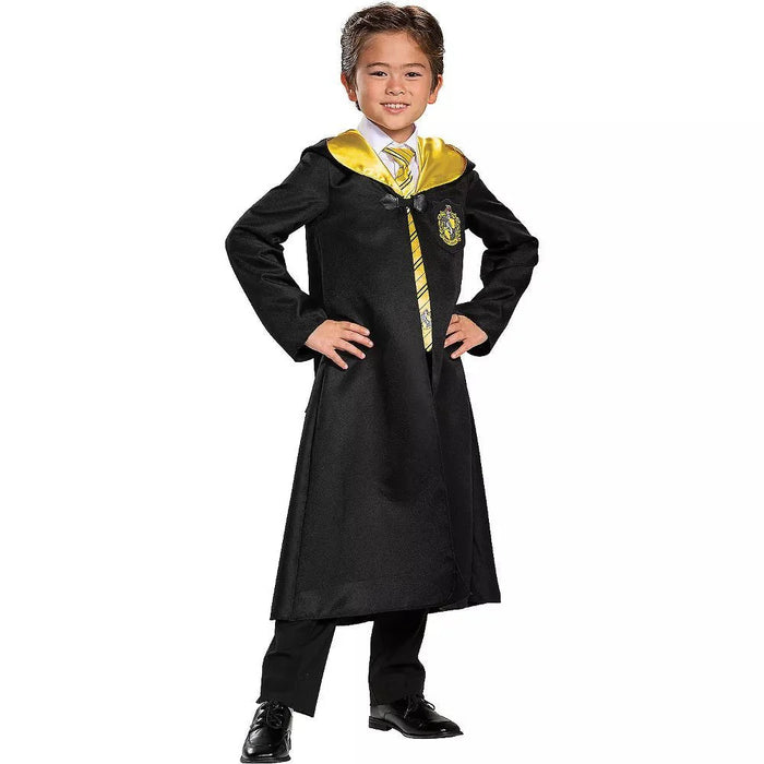Child wearing a black wizard robe with yellow-lined hood and yellow striped tie, featuring a house crest emblem on the chest.