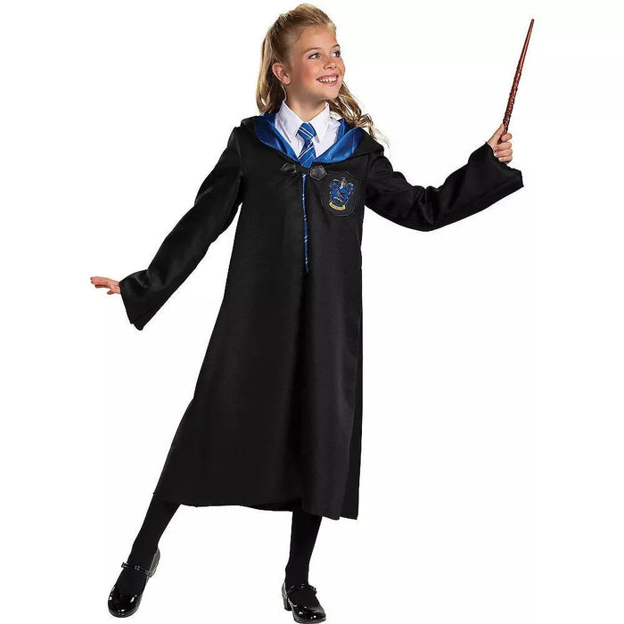 Child wearing a black wizarding robe with blue-trimmed collar and Ravenclaw crest, holding a wand, styled with white shirt and blue tie.