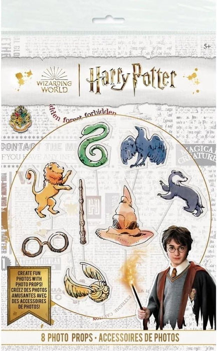 Harry Potter themed photo prop set with 8 cardboard cutouts including a wand, glasses, snake, sorting hat, winged creatures, and Harry Potter character figure on white packaging.