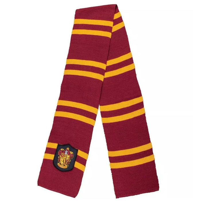 Maroon and gold striped knit scarf with a house crest patch featuring a lion emblem on one end.