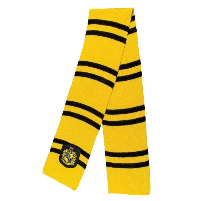 Yellow knit scarf with black horizontal stripes and a Hufflepuff house crest emblem on the lower left.
