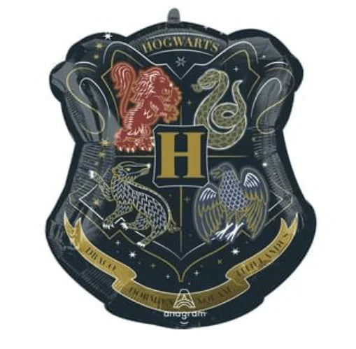 Black shield-shaped mylar balloon featuring the Hogwarts crest with four house emblems, a central H, and gold banner text on a dark starry background.
