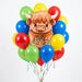 Brown highland cow foil balloon with "Herd it was your Birthday" text surrounded by a cluster of red, yellow, blue, and green latex balloons with colorful ribbons.