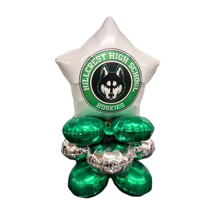 White star-shaped balloon above a green and silver metallic balloon quad displaying a husky mascot logo and "Hillcrest High School Huskies" text.