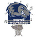Hunter Wolverines school logo centerpiece spray featuring a gray wolf head on dark blue background with white text, surrounded by silver star decorations and tied with a gray ribbon bow.