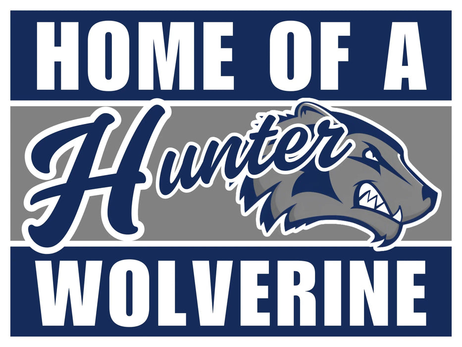 Navy and gray yard sign featuring a Hauler Wolverine mascot logo with white text reading "Home of a Hauler" and "Wolverine" on top and bottom bands.