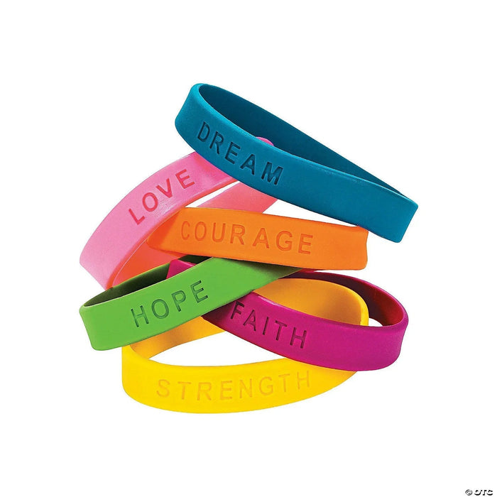 Stack of colorful rubber bracelets in blue, pink, orange, green, magenta, and yellow, each embossed with inspirational words including Dream, Love, Courage, Hope, Faith, and Strength.