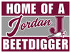 Maroon and gray yard sign reading "Home of a Jordan Beetdigger" with large J logo and beetdigger illustration, 24 by 18 inches.