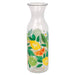 Clear glass carafe with a tapered shape decorated with illustrated lemons, limes, orange slices, and green leaves in yellow, orange, and green tones.