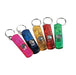 Five cylindrical key chain flashlights in pink, blue, gold, red, and green with compasses and whistles attached to metal key rings.
