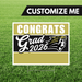 Graduation-themed customizable sign with 'Congrats Grad 2026' on a grass background