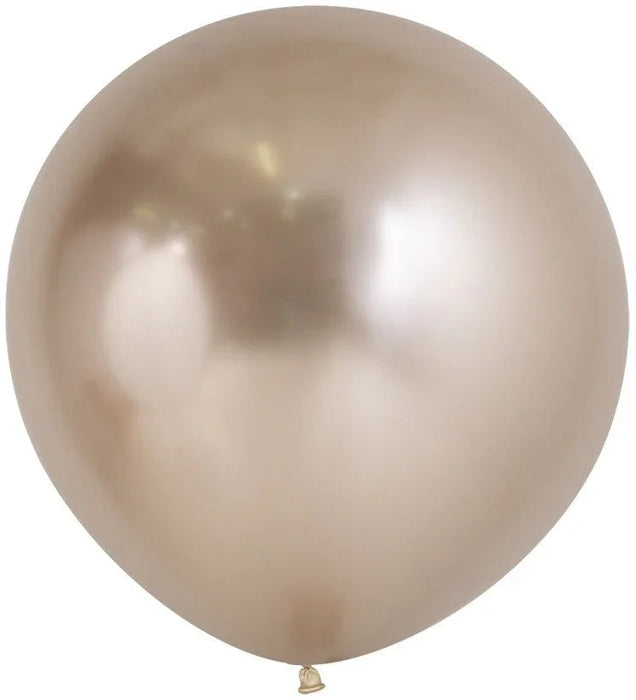 Single large champagne-colored latex balloon with a pearlescent sheen and reflective surface against a white background.