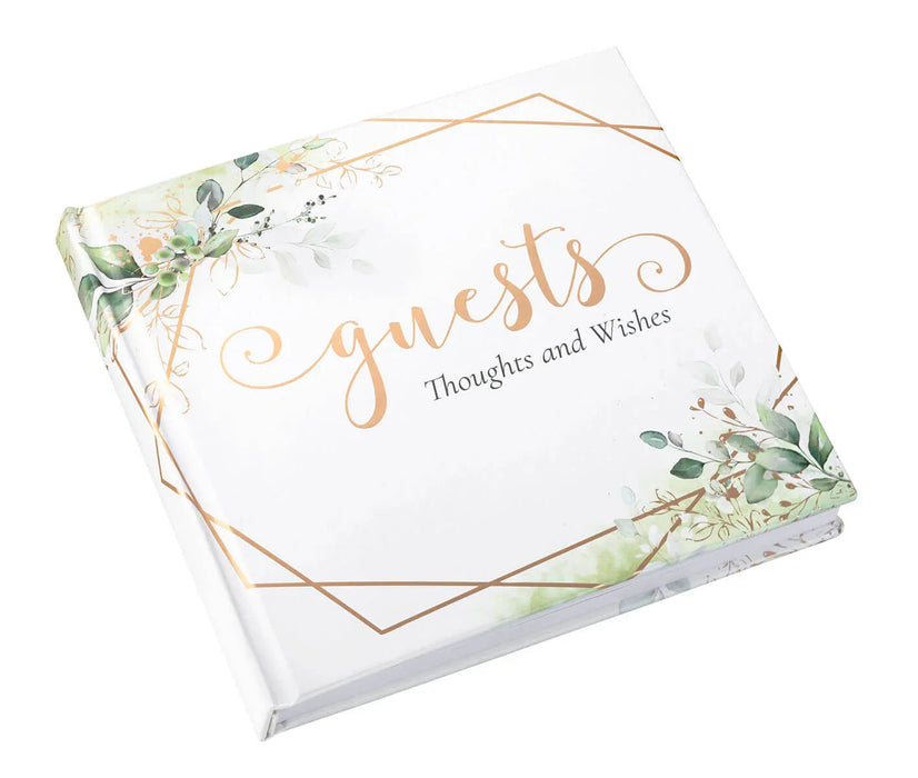 White hardcover guest book with peach script text reading "Guests" and "Thoughts and Wishes," framed by geometric gold diamond shapes and watercolor botanical illustrations in green and peach tones.
