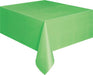 Lime green rectangular tablecloth draped over a table, showing the fabric's solid color and draping folds.