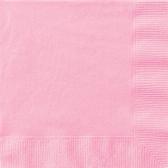 Pink paper dinner napkins with a quilted texture pattern visible along the edges and corners.