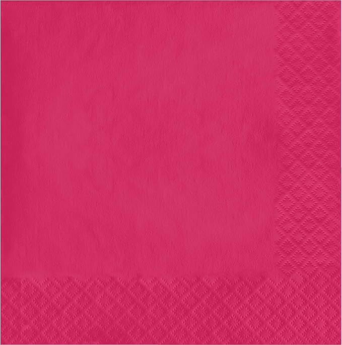 Bright magenta paper napkins with a quilted texture pattern visible on the right and bottom edges against a solid colored background.