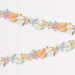 Liberty Floral Paper Flower Garland with layered floral paper flowers, greenery, and peach, white, pink, blue, yellow, and gold accents.
