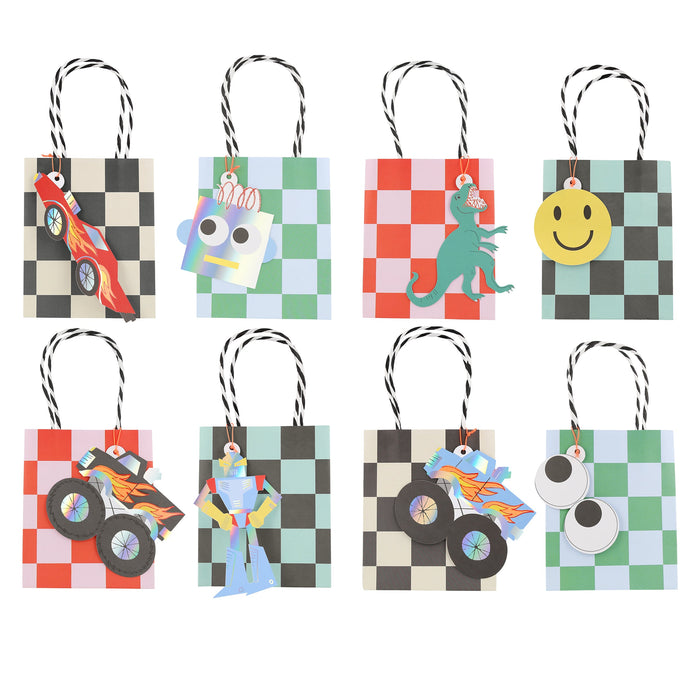 Toybox Icon Party Bags with assorted checkerboard designs and toy-themed tags including race cars, robots, dinosaurs, smiley faces, monster trucks, and googly eyes.
