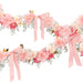 Flower & Bow Garland Set with pink and cream flowers, leafy accents, gold details, and pink ribbon bows on a white background.