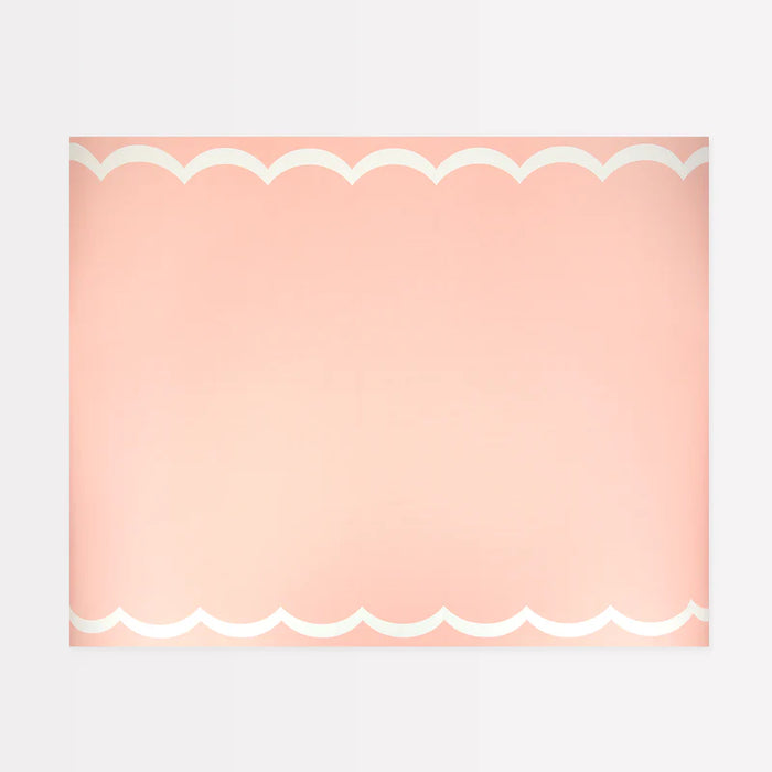 Scalloped Edge Pink Table Runner with a soft pink background and white scalloped border details.
