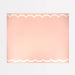 Scalloped Edge Pink Table Runner with a soft pink background and white scalloped border details.
