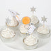 Space Cupcake Kit with frosted cupcakes in silver cases decorated with rocket, astronaut, planet, and glittery star toppers on a white plate.