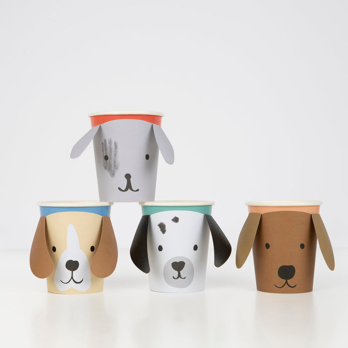Puppy Cups with assorted dog face designs, floppy paper ears, and colorful cup rims.