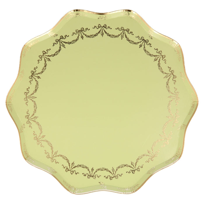 Gold Bow Scalloped Edge Dinner Plate with pale green background, gold bow garland details, gold trim, and scalloped edge on a white background.