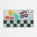 Toybox Icon Candles featuring a race car, dinosaur, monster truck, robot, and smiley face in a checkered box.