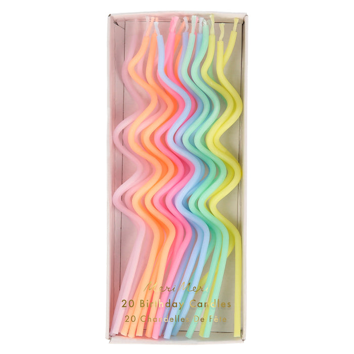 Pastel Swirly Candles in assorted soft colors with wavy shapes packaged in a clear box.