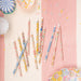 Liberty Floral party candles with assorted pink, blue, yellow, and multicolor floral prints for cakes and cupcakes.