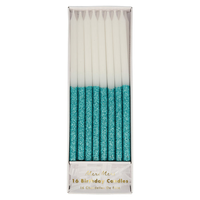 Blue Glitter Dipped Candles in clear packaging with white birthday candles and sparkling blue glitter dipped ends.