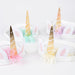 Meadow Unicorns Horn Headbands with white bands, unicorn ears, shiny gold horns, and pastel fringe accents.
