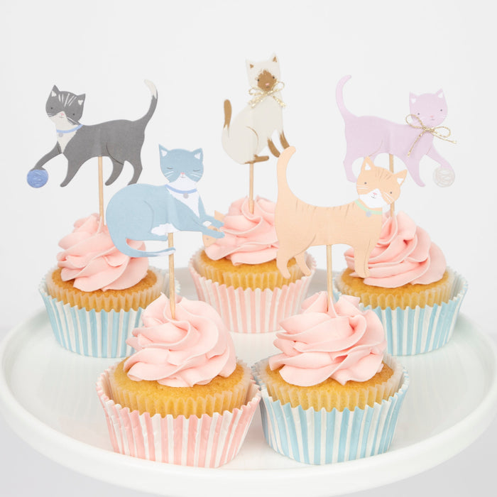 Cute Kittens Cupcake Kit with pastel striped cupcake cases and assorted illustrated kitten toppers on cupcakes with pink frosting.