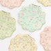 Ladurée Paris Floral Side Plates in assorted pastel colors with delicate floral patterns, butterfly details, and gold scalloped trim.