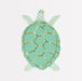 Turtle Napkins shaped like a mint green sea turtle with gold shell details and soft patterned flippers on a white background.