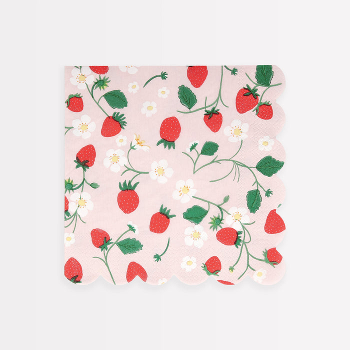 Strawberry pattern large napkins with red strawberries, white flowers, green vines, and scalloped edges on a pink background.
