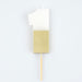 White number 1 cake candle with metallic gold dipped finish and wooden pick on a white background.
