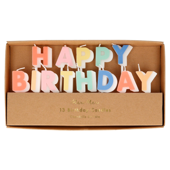 Happy Birthday candle set with pastel letter candles spelling “Happy Birthday” in kraft display packaging.