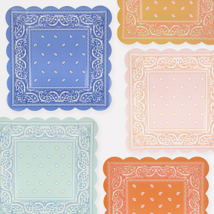 Western square plates with assorted bandana-inspired paisley prints, scalloped edges, and colorful designs.