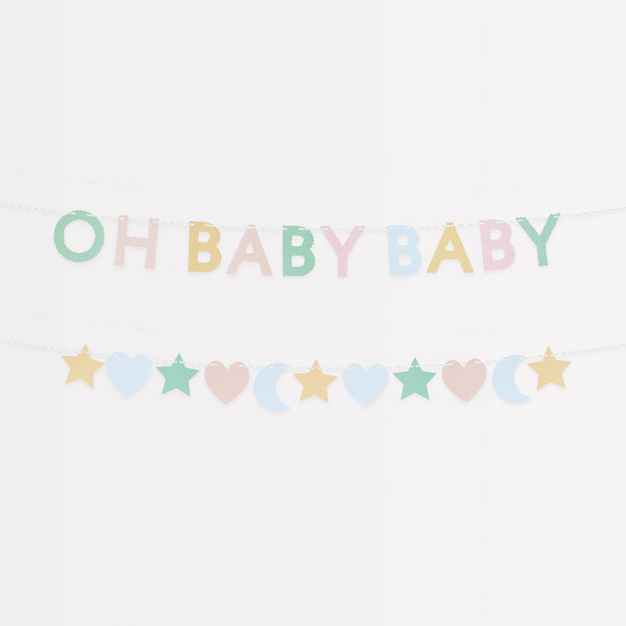 Baby Mini Garland Matchbox set with pastel Oh Baby Baby letters and a second garland with stars, hearts, and moon shapes.