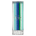 Blue, white, and green glitter birthday candles in a 24-count box with silver sparkle accents and white candle holders.
